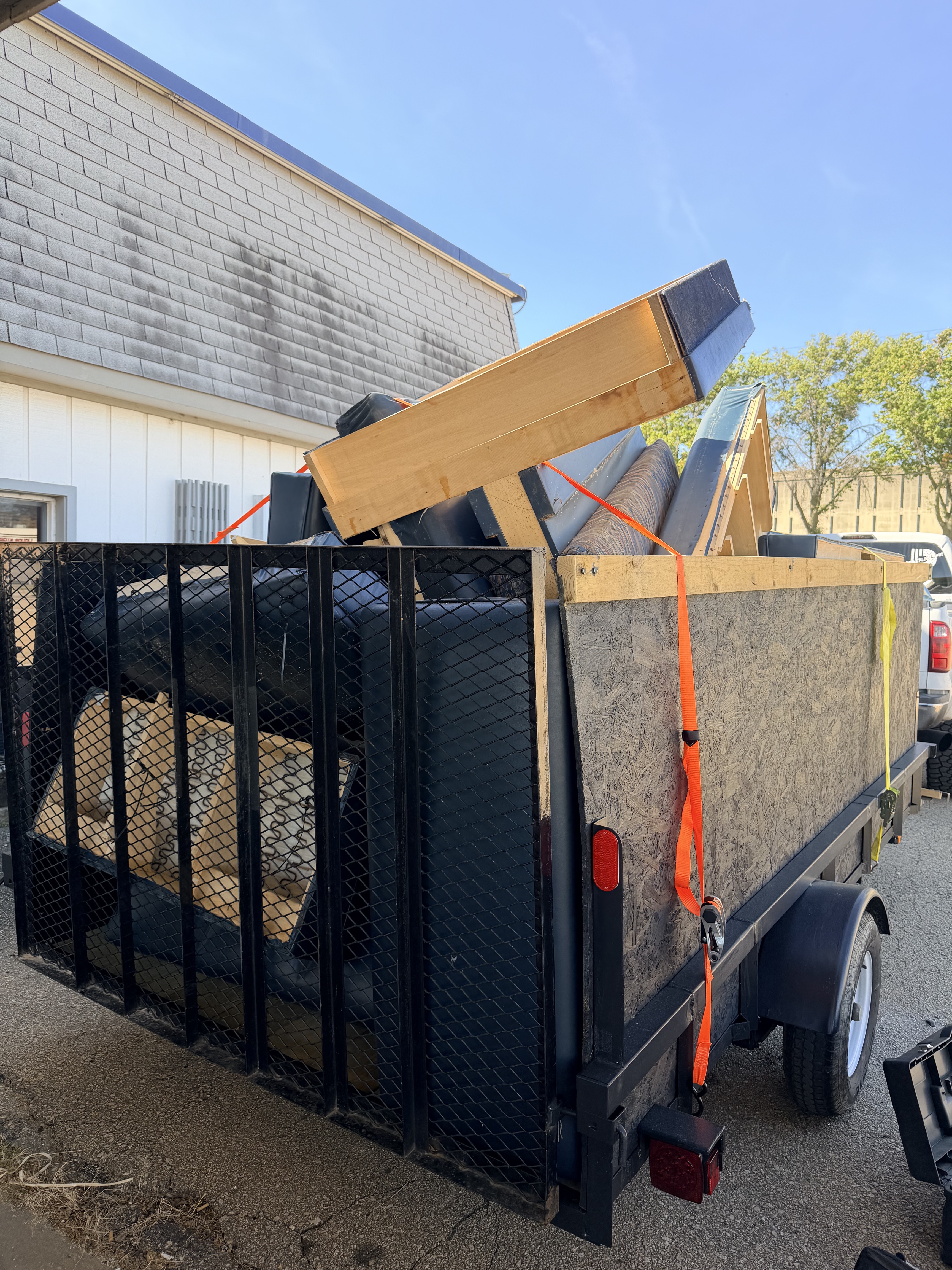 Apartment complex furniture haul — daytime