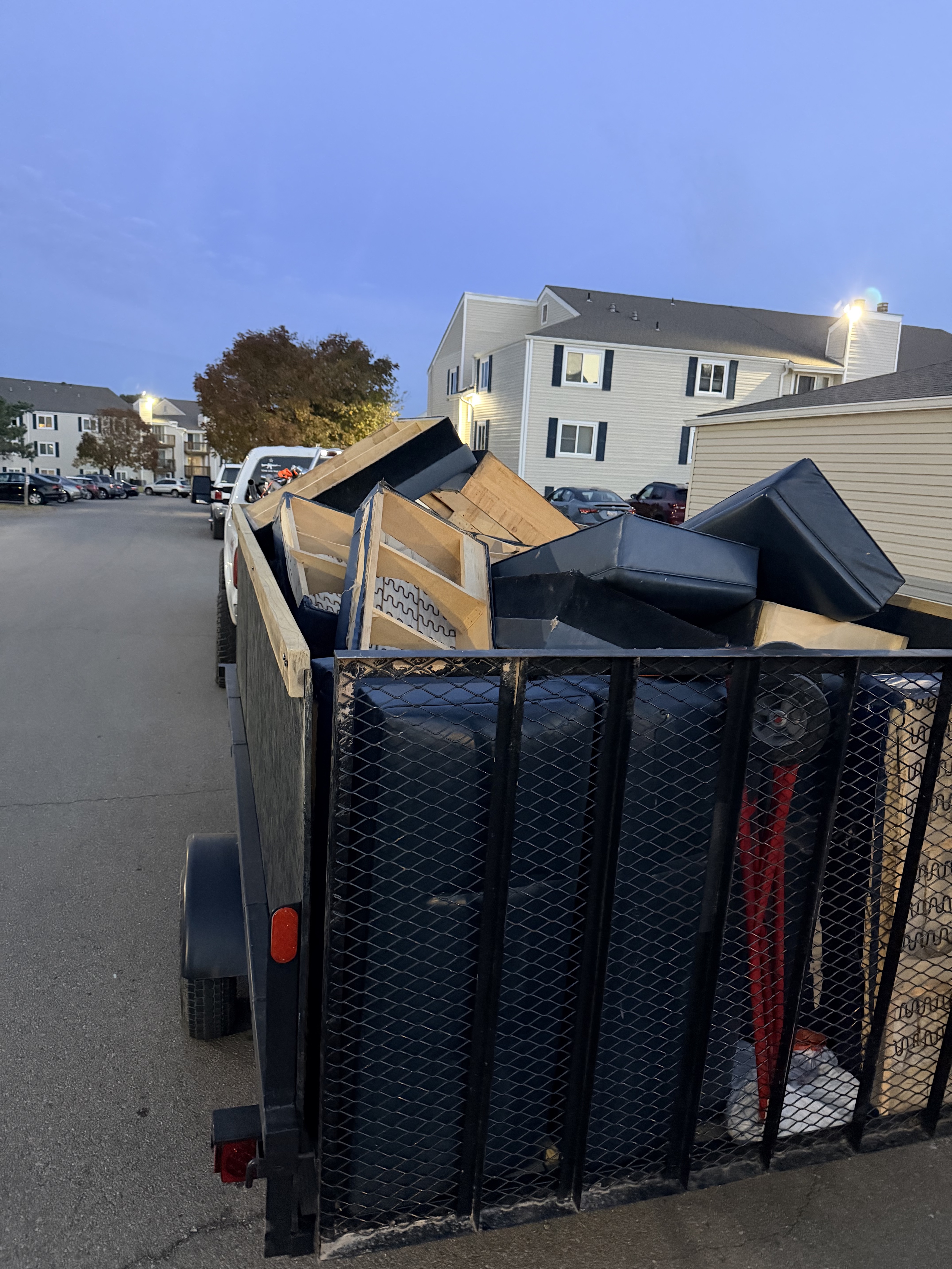Apartment complex furniture haul — evening load