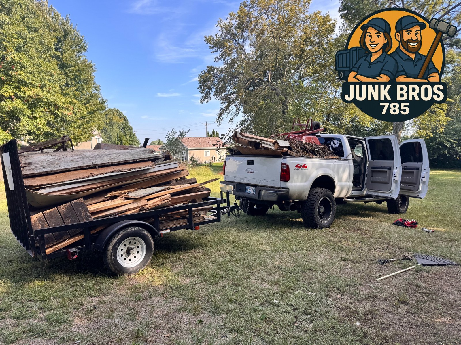 Trailer stacked with boards and debris